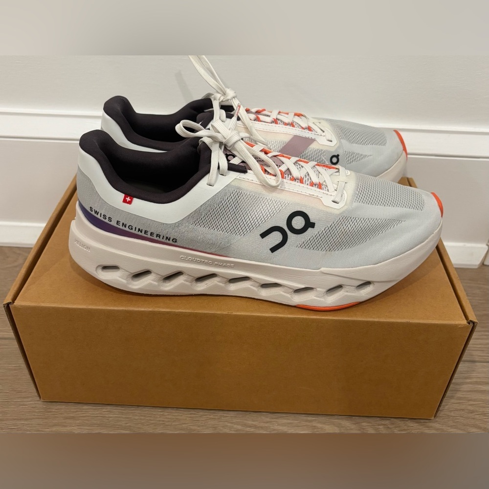 On Running Men's White Running Shoes with Black and Orange Accents